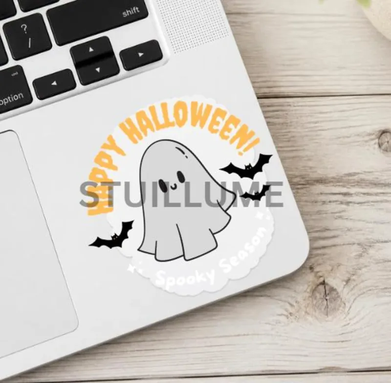 Cute Halloween ghost sticker with orange Happy Halloween lettering and black bats on a white background